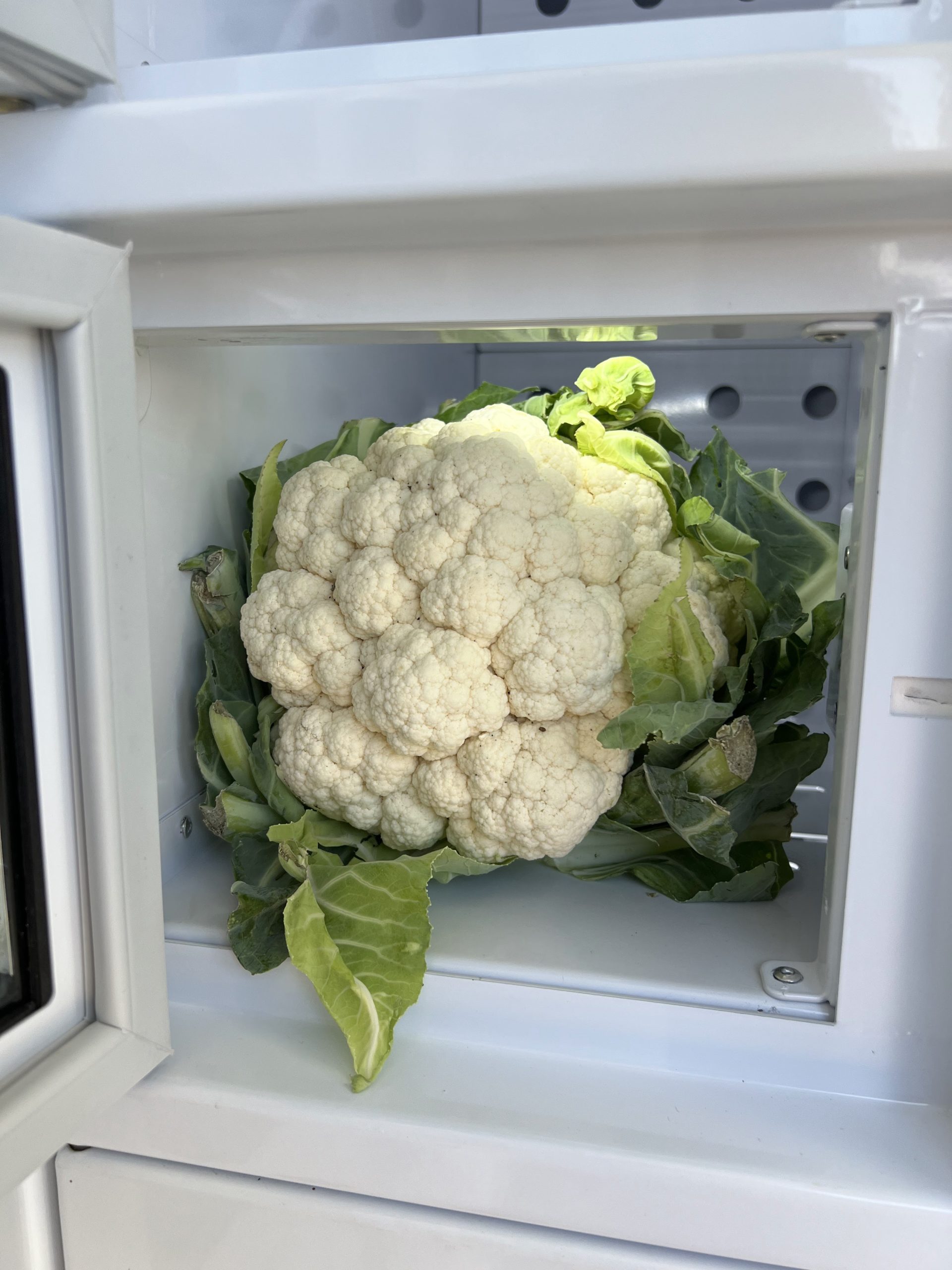Image d'un chou fleur dans un casier réfrigéré